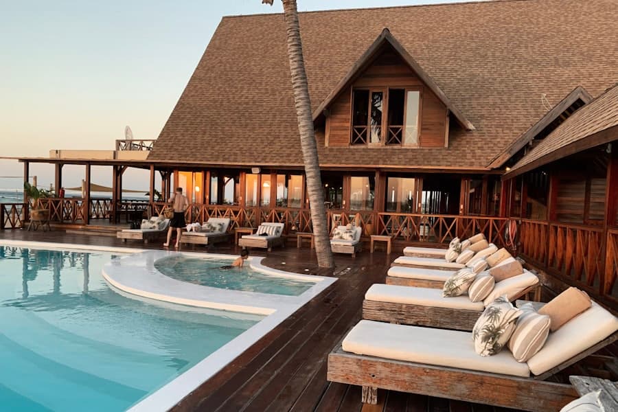 Hotel exterior at dusk with warm interior lighting